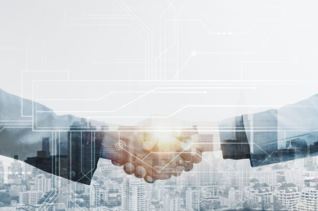 Business partners handshake global corporate with technology con